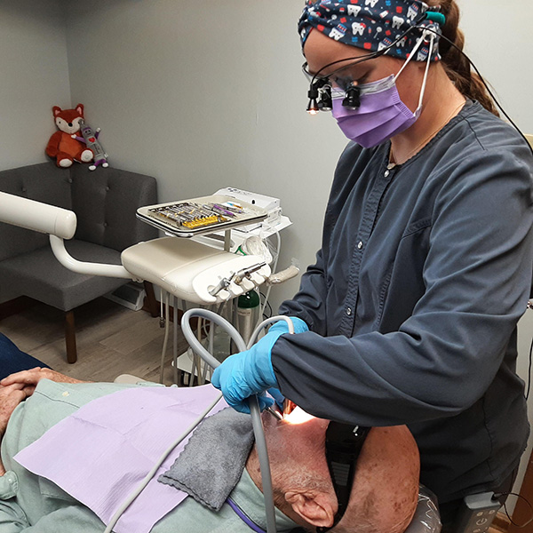 Air polishing procedure being done